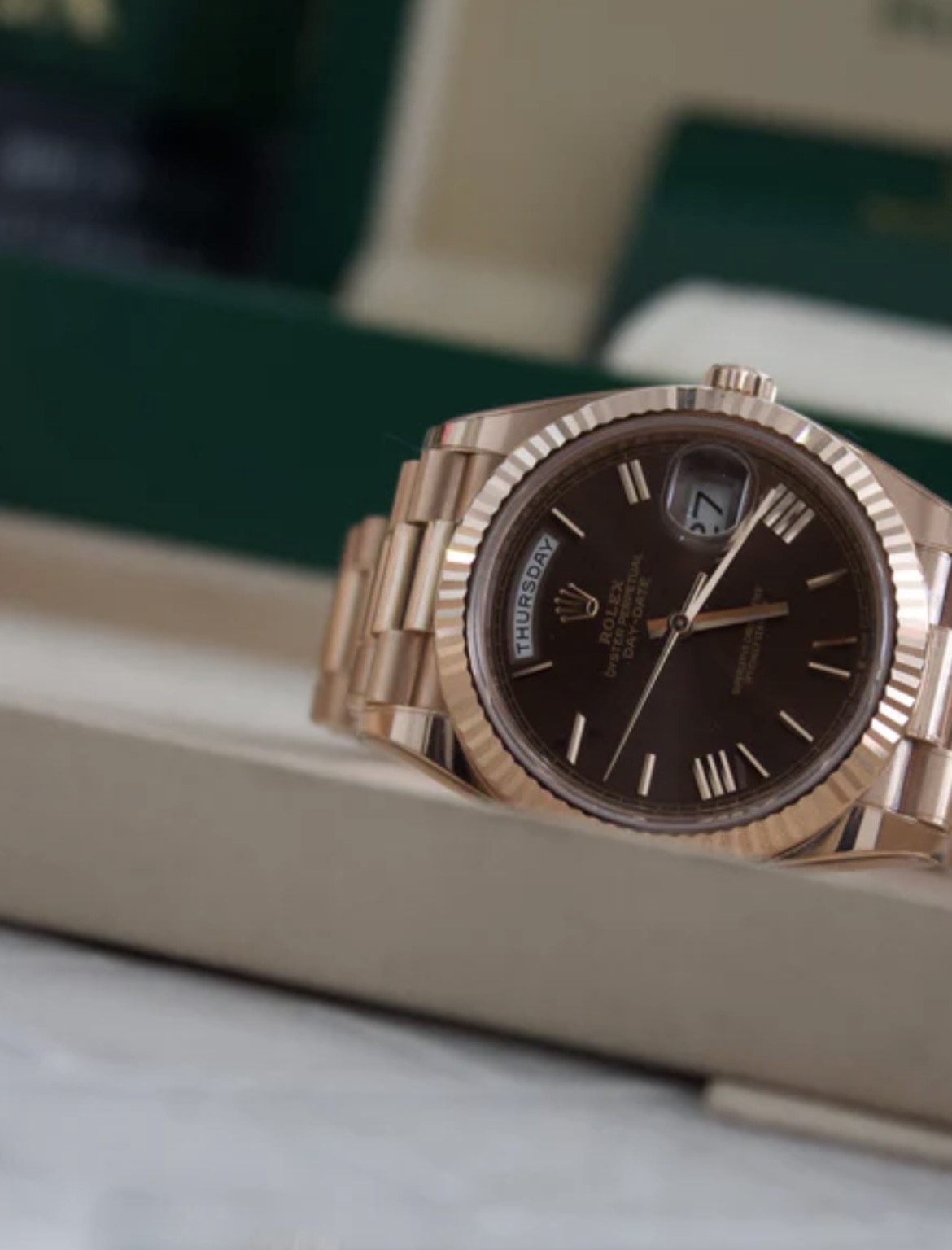 Rolex Daydate 40 ' Presidential " Rose Gold Chocolate Roman Dial